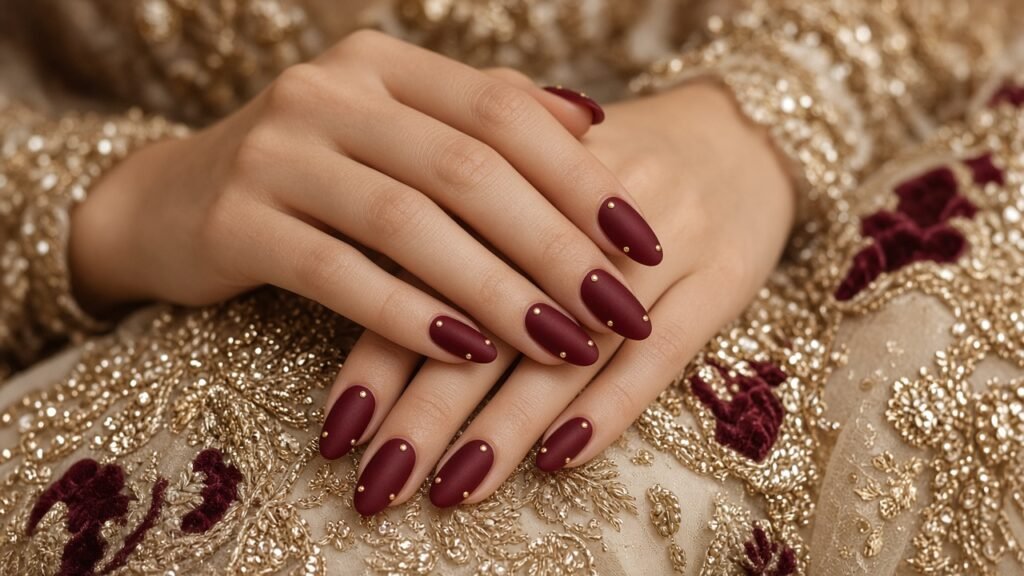 Maroon Velvet with Gold Studs - red and gold wedding nails